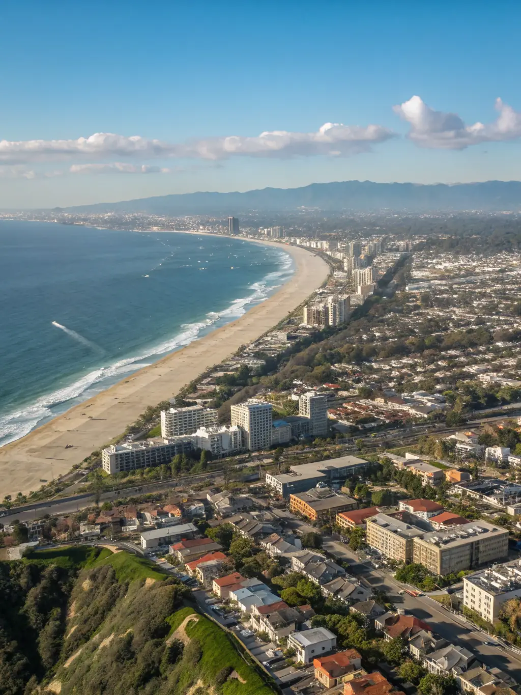 An aerial view showcasing diverse San Diego neighborhoods, from the beaches of La Jolla to the urban vibe of downtown, highlighting the variety of options.